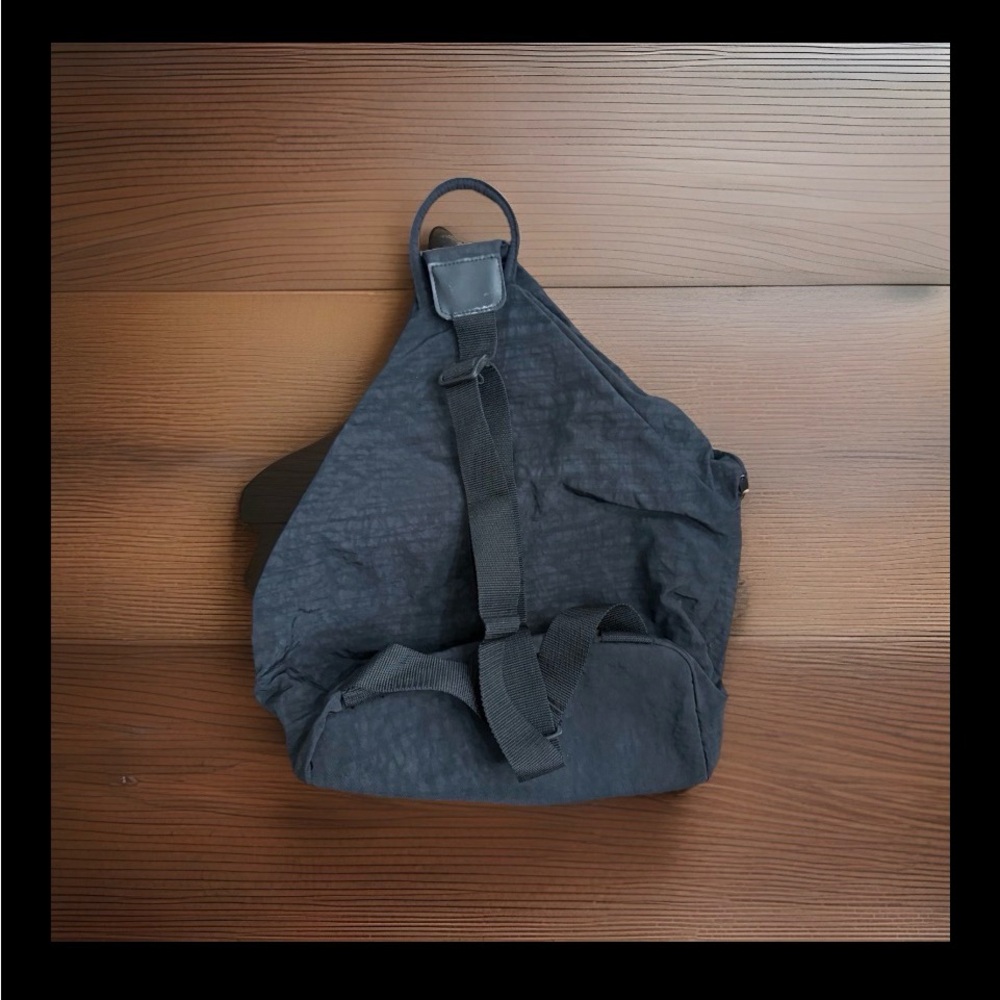GAIAM Black Sling Backpack - Compact Crossbody Pack